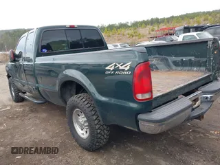 2001 Ford Super Duty F-250 XL with VIN 1FTNX21SX1EA07328, listed as a IAAI auction lot 41493164 with 221,991 mi miles. Bid and sale history available at carsss.com. Image 3.