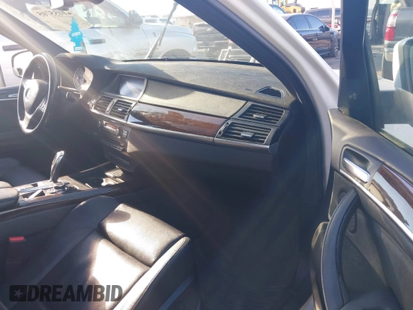 2012 BMW X5 35d with VIN 5UXZW0C56CL665631, listed as a IAAI auction lot 41055705 with 179,408 mi miles and . Bid and sale history available at DreamBid. Image 5.