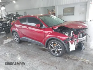 2018 Toyota C-HR XLE z VIN NMTKHMBX2JR039656, wystawiony jako IAAI lot #42228236 z przebiegiem 126 334 mil mil oraz . Historia ofert i sprzedaży dostępna na DreamBid. Obrazek 1.