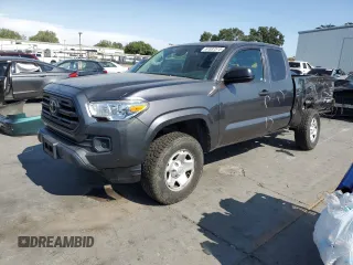 2019 Toyota Tacoma SR with VIN 5TFRX5GN5KX139892, listed as a Copart auction lot 61837515 with 106,572 mi miles and Salvage title. Bid and sale history available at DreamBid. Image 1.