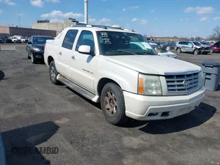 2004 Cadillac Escalade EXT z VIN 3GYEK62N24G294489, wystawiony jako IAAI lot #41887062 z przebiegiem 159 000 mil mil oraz . Historia ofert i sprzedaży dostępna na DreamBid. Obrazek 1.