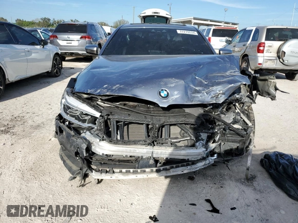 2018 BMW 5 Series M550i xDrive with VIN WBAJB9C53JB034947, listed as a Copart auction lot 77270534 with Not provided miles and Non repairable. Bid and sale history available at DreamBid. Image 5.