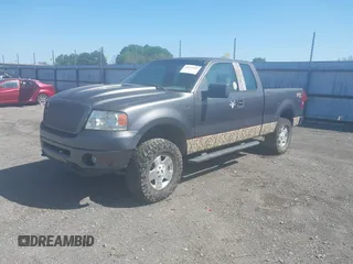 2007 Ford F-150 STX with VIN 1FTRX14W47FA54576, listed as a IAAI auction lot 41971521 with 220,945 mi miles. Bid and sale history available at carsss.com. Image 2.