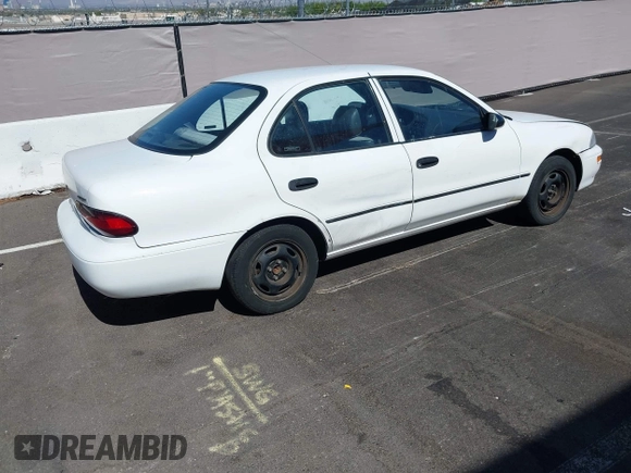 1997 Geo Prizm LSi z VIN 1Y1SK5269VZ446843, wystawiony jako IAAI lot #42521888 z przebiegiem 72 451 mil mil oraz . Historia ofert i sprzedaży dostępna na DreamBid. Obrazek 4.
