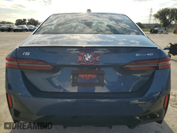 2024 BMW i5 eDrive40 with VIN WBY33FK00RCR76973, listed as a Copart auction lot 67562934 with 4,315 mi miles and Salvage Title. Bid and sale history available at carsss.com. Image 6.