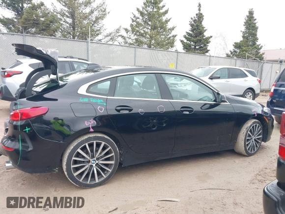 2021 BMW 2 Series 228i xDrive with VIN WBA73AK06M7H58799, listed as a IAAI auction lot 42172057 with 71,412 mi miles and . Bid and sale history available at DreamBid. Image 14.