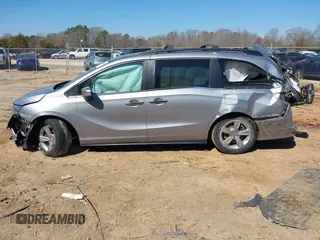 2019 Honda Odyssey EX-L z VIN 5FNRL6H70KB121473, wystawiony jako IAAI lot #41650693 z przebiegiem 77 605 mil mil oraz . Historia ofert i sprzedaży dostępna na DreamBid. Obrazek 14.
