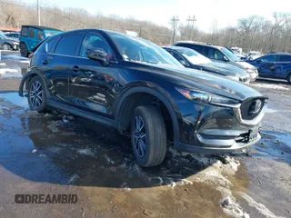 2018 Mazda CX-5 Touring with VIN JM3KFBCM2J0451828, listed as a IAAI auction lot 41531728 with 88,939 mi miles. Bid and sale history available at carsss.com. Image 1.