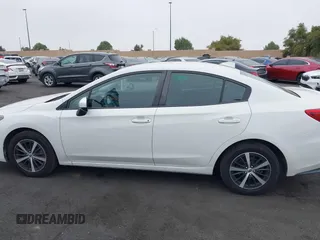 2021 Subaru Impreza Premium with VIN 4S3GKAV61M3604298, listed as a IAAI auction lot 42011198 with 50,667 mi miles and . Bid and sale history available at DreamBid. Image 15.
