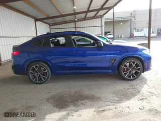 2022 BMW X4 M with VIN 5YM23EC05N9J74682, listed as a IAAI auction lot 41420906 with 46,314 mi miles. Bid and sale history available at carsss.com. Image 13.