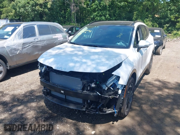 2025 Kia Sportage SX-Prestige with VIN 5XYK5CDF2SG301912, listed as a IAAI auction lot 42553193 with 1,816 mi miles and . Bid and sale history available at DreamBid. Image 6.