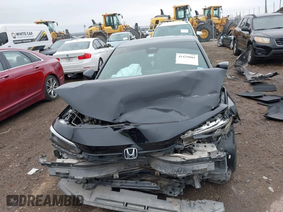 2022 Honda Civic Sport z VIN 2HGFE2F59NH514315, wystawiony jako IAAI lot #41429001 z przebiegiem 96 459 mil mil oraz . Historia ofert i sprzedaży dostępna na DreamBid. Obrazek 13.