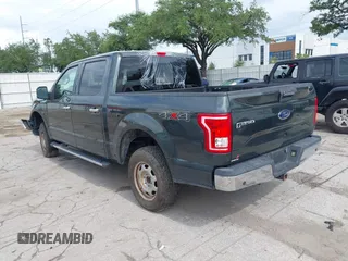 2015 Ford F-150 XLT with VIN 1FTEW1EG5FFA99713, listed as a IAAI auction lot 42481854 with 165,415 mi miles and . Bid and sale history available at DreamBid. Image 3.