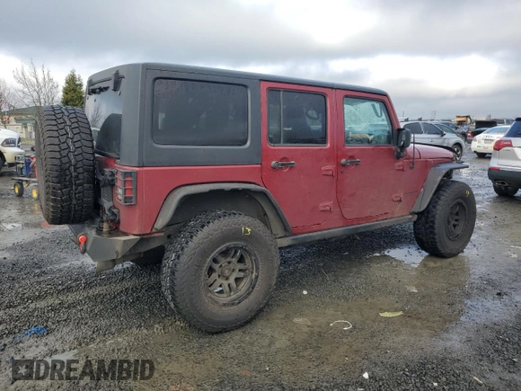 2012 Jeep Wrangler Unlimited Rubicon with VIN 1C4HJWFG2CL219021, listed as a Copart auction lot 87451784 with 109,675 mi miles and Salvage title. Bid and sale history available at DreamBid. Image 3.