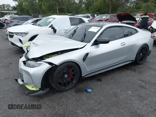 2022 BMW M4 Competition with VIN WBS33AZ04NCJ20184, listed as a IAAI auction lot 41205528 with 25,571 mi miles. Bid and sale history available at carsss.com. Image 2.