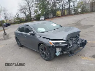 2021 Volkswagen Passat SE z VIN 1VWSA7A36MC000433, wystawiony jako IAAI lot #41824439 z przebiegiem 74 843 mil mil oraz . Historia ofert i sprzedaży dostępna na DreamBid. Obrazek 1.