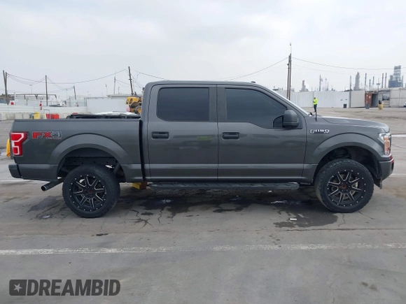2018 Ford F-150 XL with VIN 1FTEW1EP4JKD45070, listed as a IAAI auction lot 42648874 with 140,424 mi miles and . Bid and sale history available at DreamBid. Image 14.