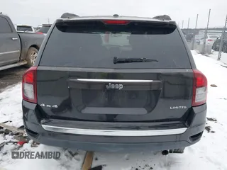 2014 Jeep Compass Limited with VIN 1C4NJDCB6ED549614, listed as a IAAI auction lot 41595768 with 114,472 mi miles. Bid and sale history available at carsss.com. Image 16.