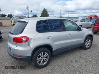 2013 Volkswagen Tiguan SEL with VIN WVGBV3AX1DW571843, listed as a IAAI auction lot 42540191 with 140,639 mi miles and . Bid and sale history available at DreamBid. Image 4.
