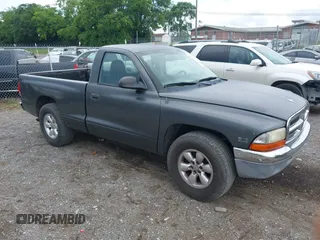 2003 Dodge Dakota z VIN 1D7FL46X43S190137, wystawiony jako IAAI lot #42525471 z przebiegiem 130 773 mil mil oraz . Historia ofert i sprzedaży dostępna na DreamBid. Obrazek 1.