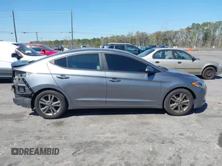 2018 Hyundai Elantra SEL z VIN 5NPD84LF5JH336295, wystawiony jako IAAI lot #41786963 z przebiegiem 96 399 mil mil oraz . Historia ofert i sprzedaży dostępna na DreamBid. Obrazek 13.