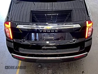 2022 Chevrolet Tahoe LS z VIN 1GNSKMKD7NR129745, wystawiony jako IAAI lot #42566236 z przebiegiem 95 126 mil mil oraz . Historia ofert i sprzedaży dostępna na DreamBid. Obrazek 10.