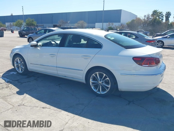2016 Volkswagen CC Sport with VIN WVWBP7AN7GE500242, listed as a IAAI auction lot 41760893 with 42,401 mi miles. Bid and sale history available at carsss.com. Image 3.