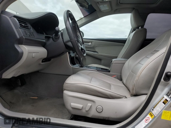 2015 Toyota Camry LE with VIN 4T1BD1FKXFU151730, listed as a Copart auction lot 54393225 with 219,892 mi miles and Salvage title. Bid and sale history available at DreamBid. Image 7.