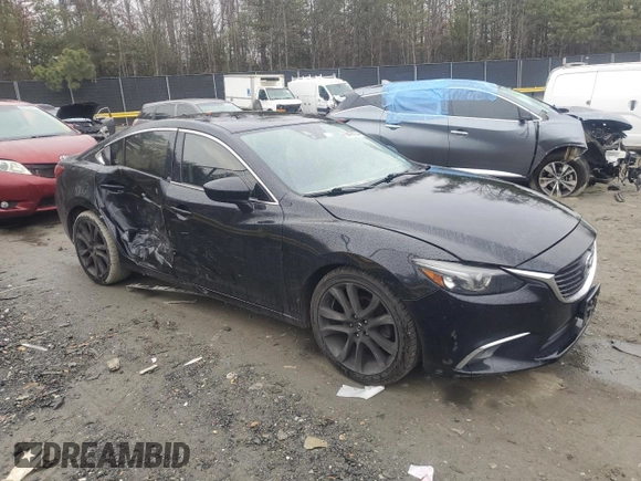 2016 Mazda 6 i Grand Touring with VIN JM1GJ1W53G1475036, listed as a Copart auction lot 86428734 with 123,416 mi miles and Salvage Title. Bid and sale history available at DreamBid. Image 4.