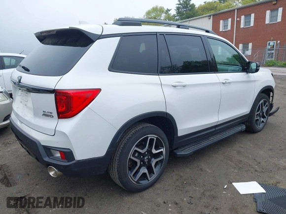 2023 Honda Passport Elite with VIN 5FNYF8H00PB022743, listed as a IAAI auction lot 42192958 with 25,165 mi miles and . Bid and sale history available at DreamBid. Image 4.