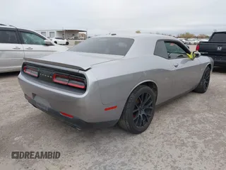 2017 Dodge Challenger R/T Shaker z VIN 2C3CDZBT3HH651390, wystawiony jako IAAI lot #41097999 z przebiegiem 128 289 mil mil oraz . Historia ofert i sprzedaży dostępna na DreamBid. Obrazek 4.