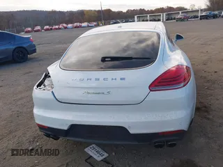 2014 Porsche Panamera S E-Hybrid with VIN WP0AD2A76EL044722, listed as a IAAI auction lot 40716615 with 52,474 mi miles and . Bid and sale history available at DreamBid. Image 16.