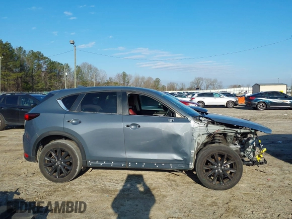 2021 Mazda CX-5 Touring with VIN JM3KFBCM8M0452700, listed as a IAAI auction lot 41490600 with 37,865 mi miles. Bid and sale history available at carsss.com. Image 14.