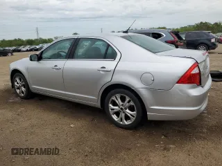 2012 Ford Fusion SE with VIN 3FAHP0HA6CR104918, listed as a Copart auction lot 57497295 with 177,017 mi miles and Salvage title. Bid and sale history available at DreamBid. Image 2.