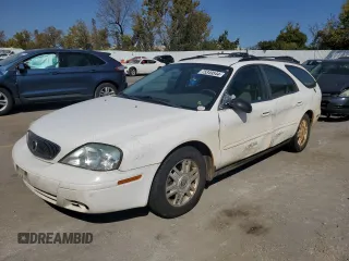 2004 Mercury Sable z VIN 1MEHM58U04A617487, wystawiony jako Copart lot #75349544 z przebiegiem 254 487 mil mil oraz Szkoda całkowita • Salvage title. Historia ofert i sprzedaży dostępna na DreamBid. Obrazek 1.