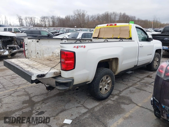 2015 Chevrolet Silverado 1500 LT with VIN 1GCNKRECXFZ414527, listed as a IAAI auction lot 41024683 with 219,673 mi miles. Bid and sale history available at carsss.com. Image 4.