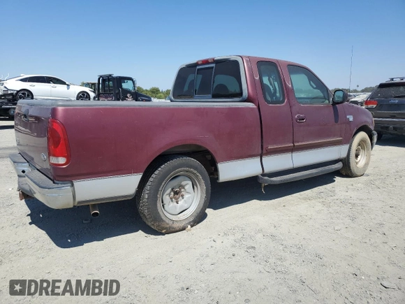 1999 Ford F-150 XL with VIN 1FTRX17L2XKB78998, listed as a Copart auction lot 65004535 with 155,271 mi miles and Salvage title. Bid and sale history available at DreamBid. Image 3.