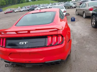 2018 Ford Mustang GT z VIN 1FA6P8CF7J5101258, wystawiony jako IAAI lot #42122472 z przebiegiem 91 700 mil mil oraz . Historia ofert i sprzedaży dostępna na DreamBid. Obrazek 16.