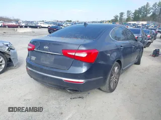 2015 Kia Cadenza Premium with VIN KNALN4D79F5195179, listed as a IAAI auction lot 41497523 with 258,695 mi miles. Bid and sale history available at carsss.com. Image 4.
