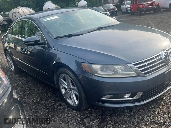 2013 Volkswagen CC R-Line with VIN WVWBP7AN1DE571321, listed as a Copart auction lot 70648784 with 122,061 mi miles and Clean Title. Bid and sale history available at carsss.com. Image 3.