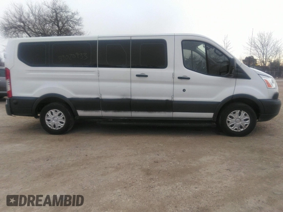 2018 Ford Transit Passenger XL z VIN 1FBZX2ZM6JKA56605, wystawiony jako IAAI lot #39020933 z przebiegiem 89 491 mil mil oraz . Historia ofert i sprzedaży dostępna na DreamBid. Obrazek 13.