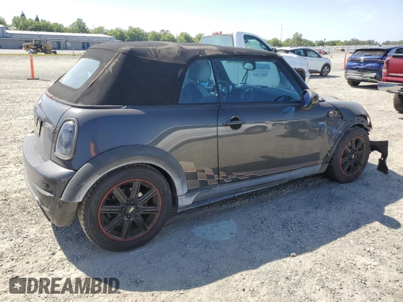 2011 MINI Convertible S с VIN WMWZP3C59BT249133, выставлен на аукционе Copart как лот 56402615 с пробегом 103 809 миль миль и Списание • Salvage title. История ставок и продаж доступна на DreamBid. Изображение 3.