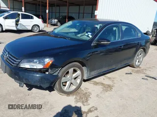 2012 Volkswagen Passat SE with VIN 1VWBH7A32CC047338, listed as a IAAI auction lot 41719936 with 184,255 mi miles. Bid and sale history available at carsss.com. Image 2.