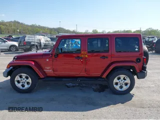 2013 Jeep Wrangler Unlimited Sahara с VIN 1C4BJWEG5DL569977, выставлен на аукционе IAAI как лот 41980394 с пробегом 145 571 миль миль и . История ставок и продаж доступна на DreamBid. Изображение 14.