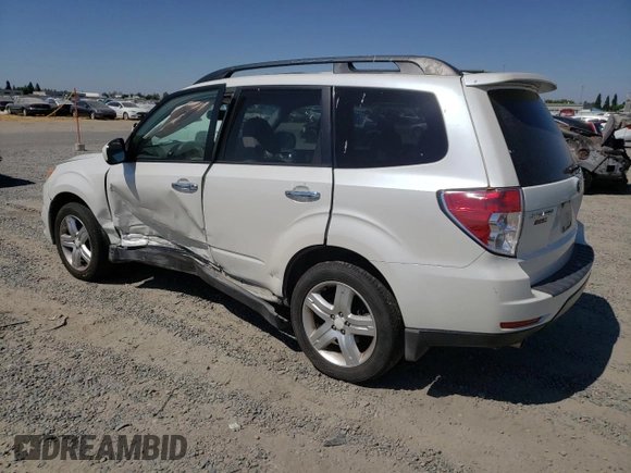 2009 Subaru Forester X with VIN JF2SH63679H777246, listed as a Copart auction lot 64516665 with 183,400 mi miles and Salvage title. Bid and sale history available at DreamBid. Image 2.