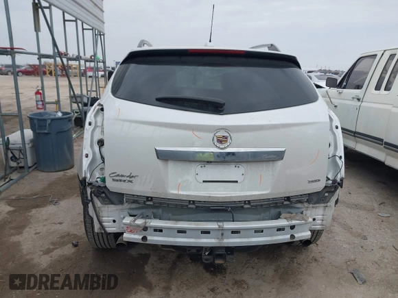 2015 Cadillac SRX Luxury Collection z VIN 3GYFNBE31FS552323, wystawiony jako IAAI lot #41553081 z przebiegiem 91 214 mil mil oraz . Historia ofert i sprzedaży dostępna na DreamBid. Obrazek 16.