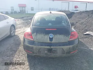 2013 Volkswagen Beetle 2.5L with VIN 3VWJP7AT1DM608370, listed as a IAAI auction lot 42088900 with Not Provided miles and . Bid and sale history available at DreamBid. Image 16.
