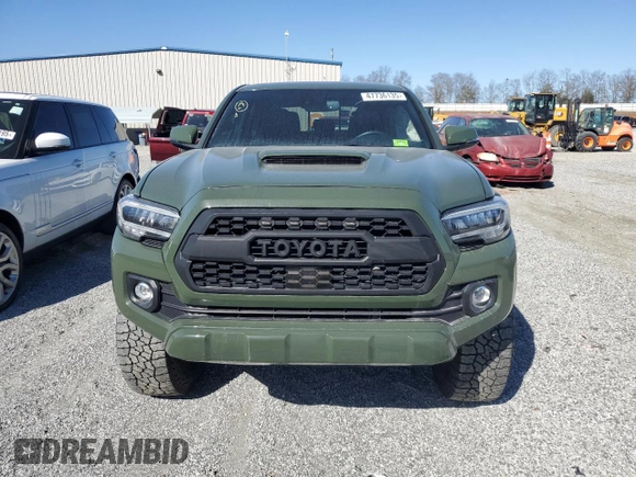 2021 Toyota Tacoma 4WD SR5 with VIN 3TMDZ5BN3MM111433, listed as a Copart auction lot 47736135 with 73,061 mi miles and Salvage Title. Bid and sale history available at carsss.com. Image 5.