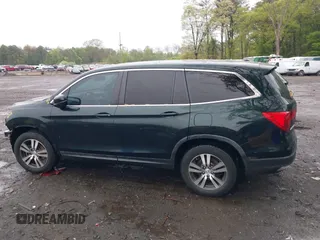 2016 Honda Pilot EX-L z VIN 5FNYF6H56GB127609, wystawiony jako IAAI lot #42186505 z przebiegiem 95 945 mil mil oraz . Historia ofert i sprzedaży dostępna na DreamBid. Obrazek 14.