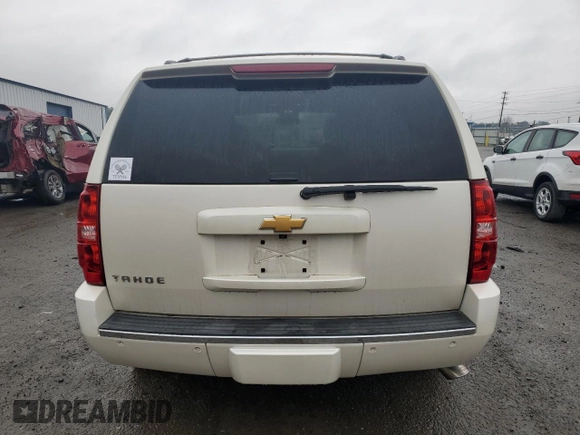 2013 Chevrolet Tahoe LTZ with VIN 1GNSCCE02DR340527, listed as a Copart auction lot 43183805 with 111,696 mi miles and Salvage title. Bid and sale history available at DreamBid. Image 6.